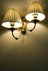 Image showing Photo of wall lamp with dim light    