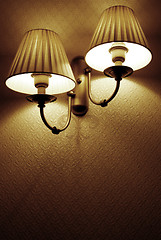 Image showing Photo of wall lamp with dim light    