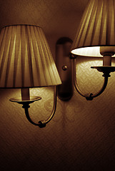 Image showing Photo of wall lamp with dim light   