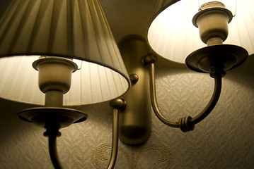 Image showing Photo of wall lamp with dim light    