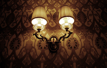 Image showing Photo of wall lamp with dim light  