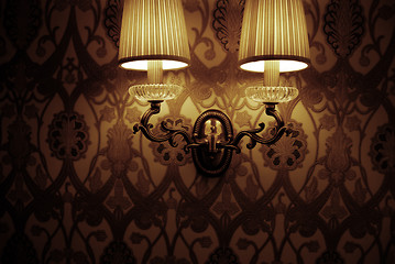 Image showing Photo of wall lamp with dim light    