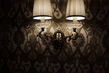 Image showing Photo of wall lamp with dim light   