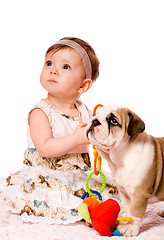 Image showing Baby and puppy