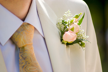 Image showing buttonhole with tea-rose