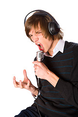 Image showing Young man singing