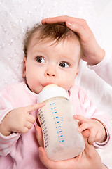 Image showing Baby eating