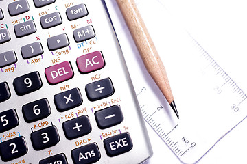 Image showing close-up of ruler,calculator,and pencil,focus on pencil-tip