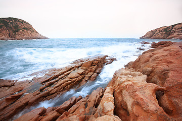 Image showing Beautiful seascape. Sea and rock at the sunset. Nature compositi