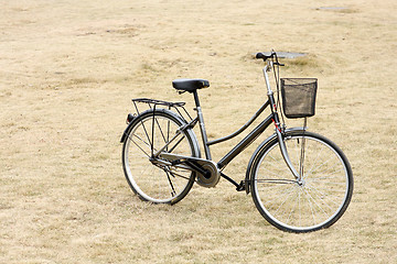 Image showing Bicycle on gass field