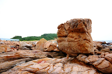 Image showing beautiful stones in a sea at the evening 