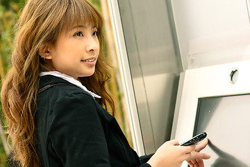 Image showing business woman play the touch screen 