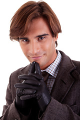 Image showing Portrait of a happy young businessman, in autumn/winter clothes