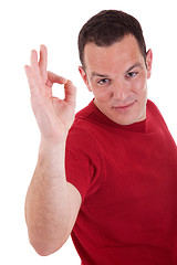 Image showing handsome man with thumb raised as a sign of ok