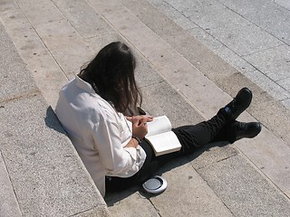 Image showing Girl reading a book.