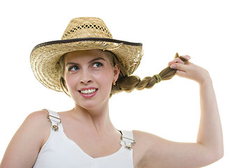 Image showing young woman in worn straw  hat