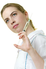 Image showing Young woman paramedic with syringe