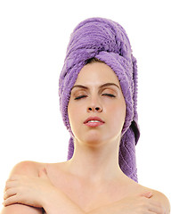 Image showing woman with closed eyes and her hair wrapped into light violet ba