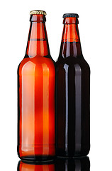 Image showing Two bottles of beer and glass