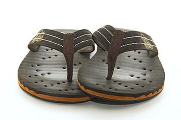 Image showing Brown flip flops on a white background