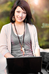 Image showing Mixed race college student with laptop