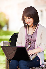 Image showing Mixed race college student with laptop