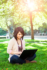 Image showing Mixed race college student with laptop