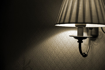 Image showing Photo of wall lamp with dim light    