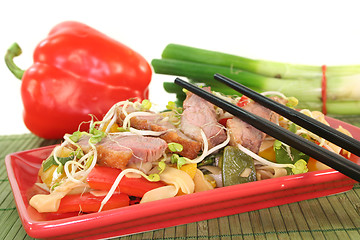 Image showing Duck breast with fried noodles