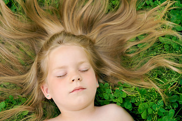 Image showing Little girl sunbathing