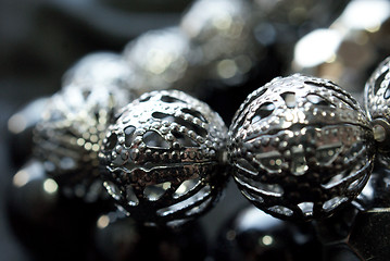 Image showing Dark Silver Beads on Black