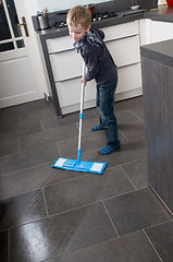 Image showing Cleaning the floor