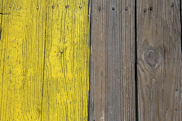Image showing Yellow painted wooden planks