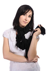 Image showing Girl in a white blouse with a black scarf, isolated