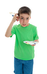 Image showing Boy thinking what to paint