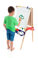 Image showing A boy painting a picture