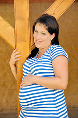 Image showing Young pregnant woman standing