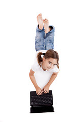 Image showing Little student girl with a laptop