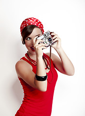 Image showing Pin-up girl with a camera