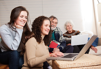 Image showing Family with laptop