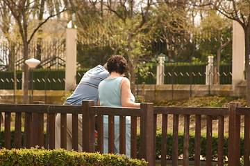 Image showing backview couple on a bridge