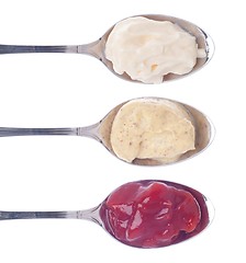 Image showing Sauces in spoons