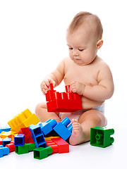 Image showing Little boy with building bricks