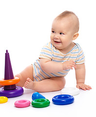 Image showing Little boy play with toys