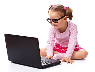 Image showing Little girl with laptop