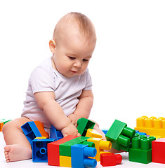 Image showing Little boy with building bricks