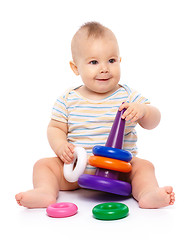 Image showing Little boy play with toys