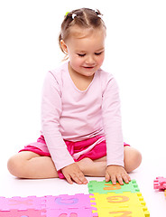 Image showing Little girl with alphabet