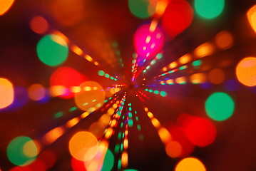 Image showing Christmas lights glowing (blur motion background)