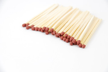 Image showing Red matches on white